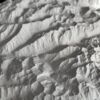 Close-up of ridges and valleys in a white 3D printed terrain map